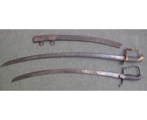 TWO GEORGE III BRITISH CAVLARY OFFICERS SWORDS to include: light cavalry troopers sword pattern 1796 with gold etched blade a