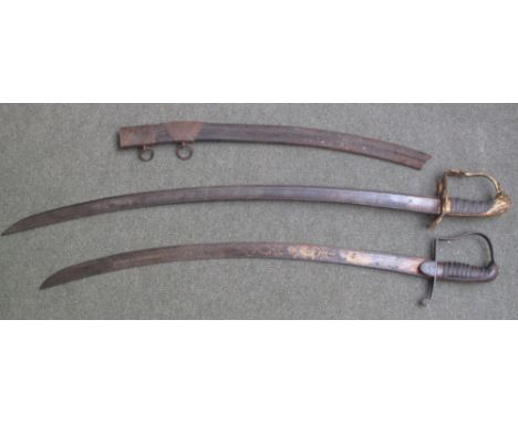 TWO GEORGE III BRITISH CAVLARY OFFICERS SWORDS to include: light cavalry troopers sword pattern 1796 with gold etched blade a