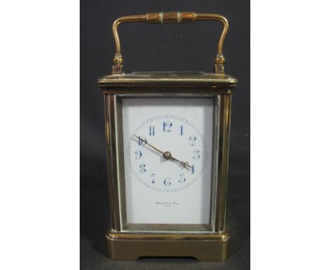 FRENCH BRASS CARRIAGE CLOCK having full depth Arabic dial marked Malletts & Son, Paris. 14.5cm high approx. (B.P. 24% incl. V