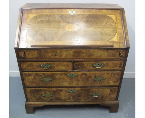 18TH CENTURY INLAID AND HERRINGBONE BANDED WALNUT FALL FRONT BUREAU, the fall decorated with central shell motif and spandrel