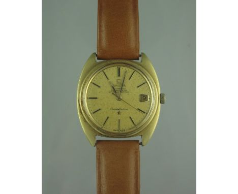 A 1960s GENTLEMAN'S OMEGA "CONSTELLATION" WRISTWATCH with date aperture and leather strap. Automatic chronometer. (B.P. 24% i