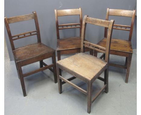 HARLEQUIN SET OF SEVEN 19TH CENTURY OAK BOBBIN AND RAIL BACK FARMHOUSE KITCHEN CHAIRS all standing on square tapering legs. (