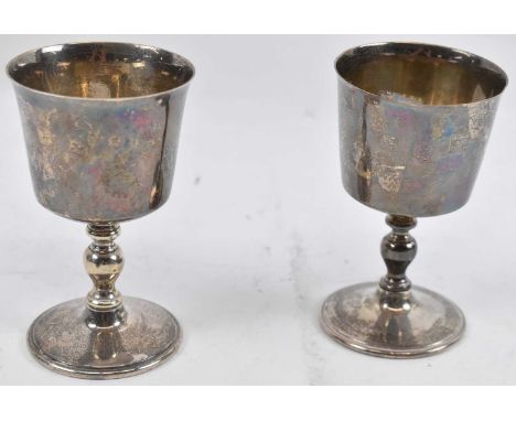 BARKER ELLIS SILVER CO; two Elizabeth II hallmarked silver goblets, marked to base no.91 and 94, height 12cm, 9.5ozt/295g.