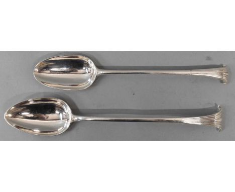 Two Georgian hallmarked silver basting spoons, graduated in size, indistinct/rubbed marks, length 26cm and 29cm, combined app