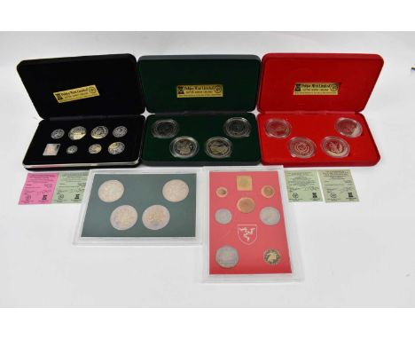 A 1980 Isle of Man sterling silver decimal cased coin set, with four other cupronickel diamond finish coin sets, all cased (5