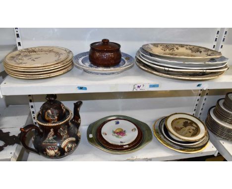 A group of 19th century and later ceramics including a treacle ware teapot, height approx 35cm, warming plate and various oth