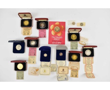 Nine Isle of Man boxed single coins, the majority silver proof examples, also a £5 coin.