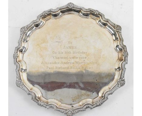 ASPREY &amp; GARRARD; a Elizabeth II hallmarked silver salver, Sheffield 2000, with engraved presentation inscription, diamet