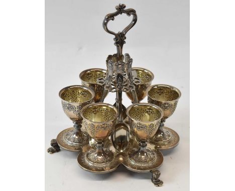 ROBERT HENNELL III; a set of six Victorian hallmarked silver egg cups, London 1860, approx 9.55ozt/297g, on an unmarked stand