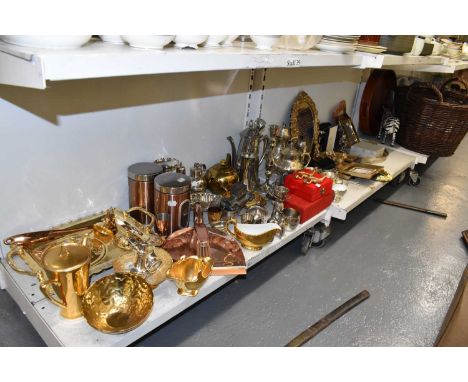 A mixed lot including silver plated teapots, coffee pots, sugar sifter, etc, brass photograph frame, gilt framed table mirror