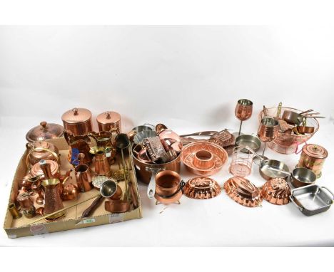A shelf of copper and other kitchen wares including pans, jelly moulds, measures, jugs, etc, and two lustreware jugs.