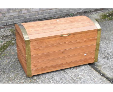 A metal bound dome topped pine trunk, 91cm x 46cm.