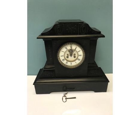 Victorian slate mantle clock, French clock movement, running and has a nice bell chime. Measures 43.5cm in height. 