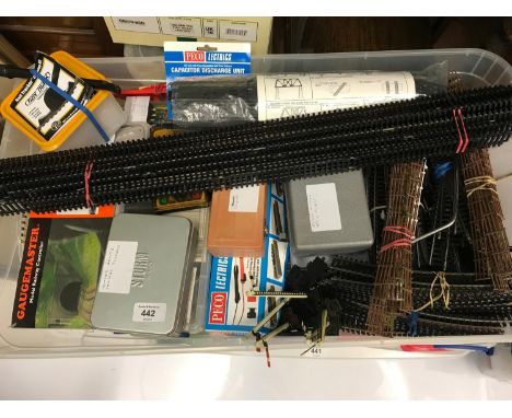 Box full of 00 Gauge track and accessories, Together with various hobby craft tools and controllers. 