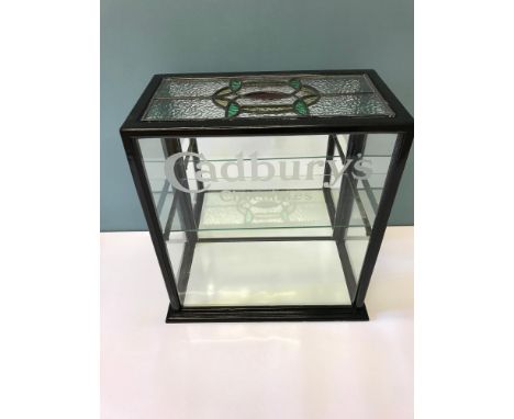 Antique shop display cabinet. Etched with Cadbury's Chocolates to the front glass panel, White glass base, Mirror backing and