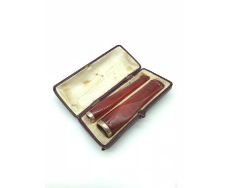 2 Vintage Cheroot cigarette holders within a fitted case. 