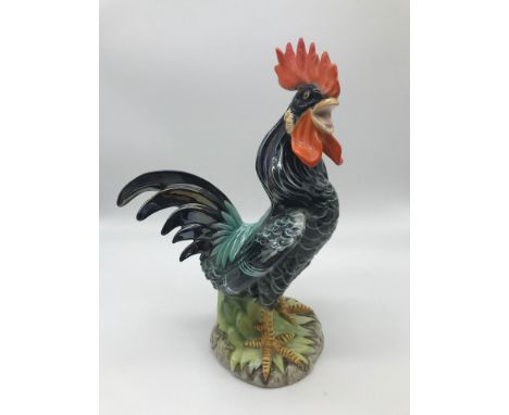 Vintage ceramic rooster figurine stamped to the base by makers. Stands 26cm in height. 