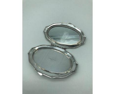 A Birmingham silver ladies compact styled in an art deco design, makers M Wachenheimer & Co Ltd. 