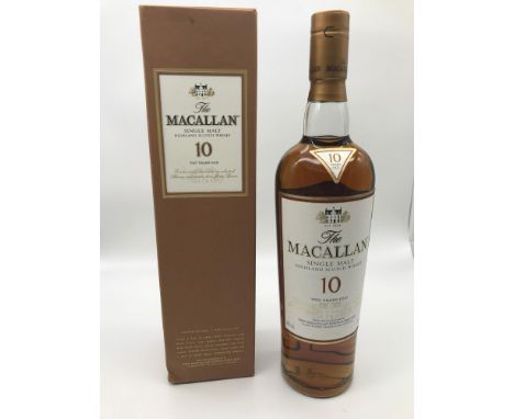 The Macallan 10 year old single malt Highland Scotch Whisky, Exclusively matured in selected Sherry oak casks. Full, Sealed a