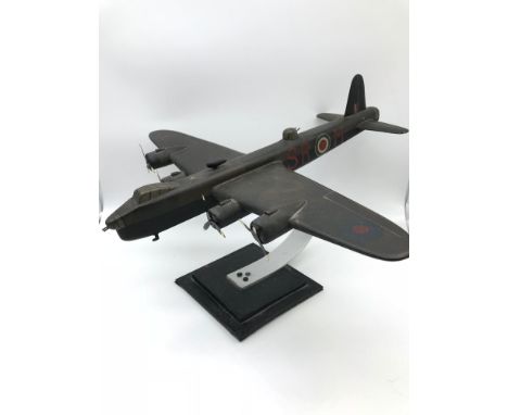 Vintage military aircraft wooden model, hand made and hand painted. Measures 25x38x40.5cm 