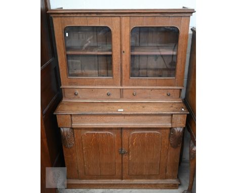 An antique oak part-glazed chiffonier bookcase, 104 x 42 x 152 cm high