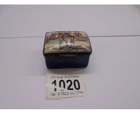 An 18th century enamel snuff box with a wrestling scene on lid, crack on bottom and a few nicks inside lid.&nbsp; 5 x 3.5cm, 
