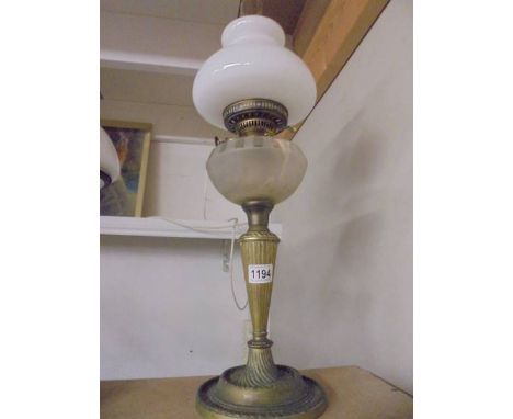 An old oil lamp with glass font. COLLECT ONLY.