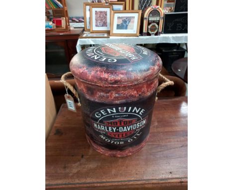 A Harley Davidson themed storage bin with cushion lid in style of a motor oil tin COLLECT ONLY