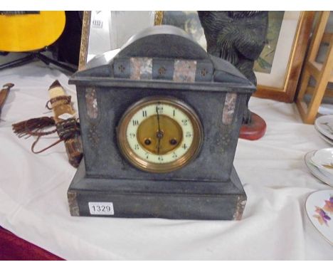 A slate clock, in working order but no key. COLLECT ONLY.