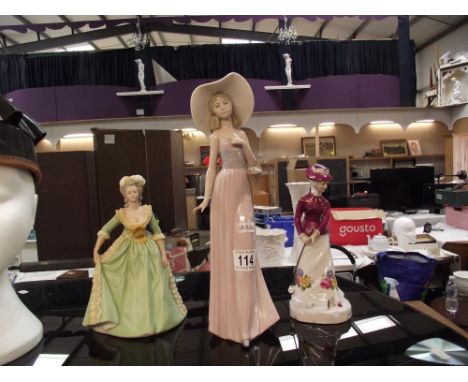 A Nao figure of a caddy &amp; a Franklin Mint figure of a lady &amp; 1 other