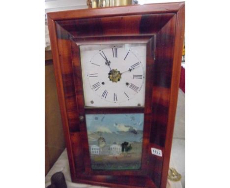 An early 20th century American wall clock. COLLECT ONLY.
