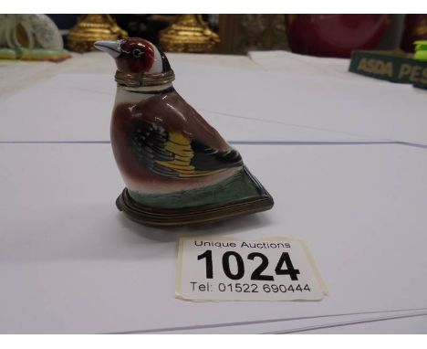 An antique English enamel bonbonniere/scent bottle in the form of a bird, circa 18c, some cracks in base, 6cm high. There are