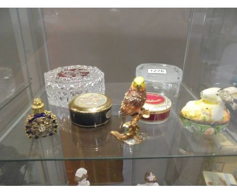 A parrot trinket box, A rabbit trinket box, an ornate scent bottle, 2 other trinket pots and 2 glass trinket pots.