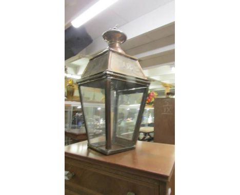 A copper lantern marked VR. COLLECT ONLY.