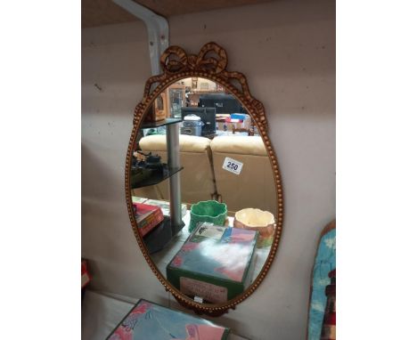 A vintage gilt framed ormolu wall mirror COLLECT ONLY