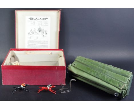 A vintage Chad Valley ' Escalado ' tabletop Horse Racing game with cast metal horses, linen race track and original box with 
