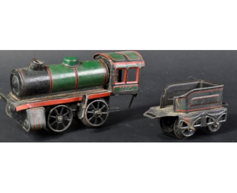 An original vintage German Karl Bub made tinplate clockwork model railway trainset locomotive engine. Green body work with re
