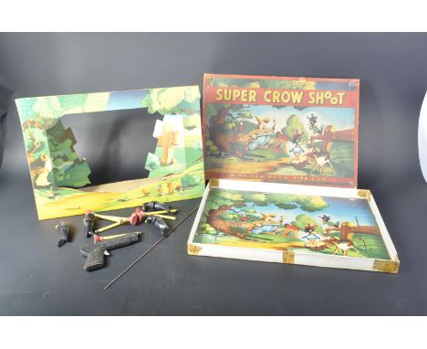 An original vintage Louis Marx &amp; Co ' Super Crow Shoot ' firing game. The game containing x4&nbsp;plastic crows,&nbsp;spr