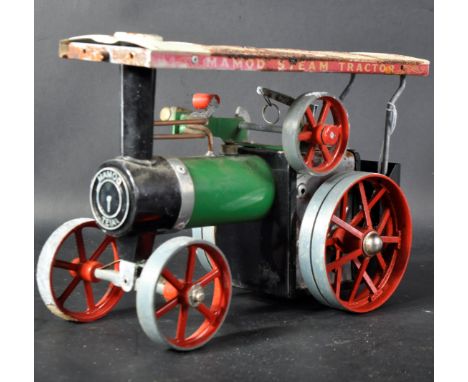 An original vintage Mamod live steam model Steam Tractor TE1A Traction Engine. A green and red model of liquid fuel example.
