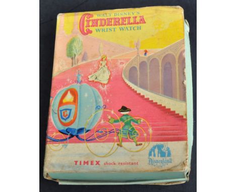 A vintage Timex made Walt Disney Cinderella boxed wrist watch. Red leather strapped watch contained in a clear plastic Cinder