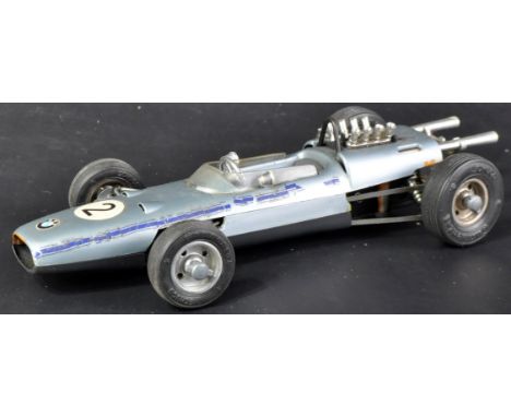 An original vintage German Schuco made Formula 2 clockwork car model No. 1072 BMW. Metallic blue bodywork with No. 2 sticker 