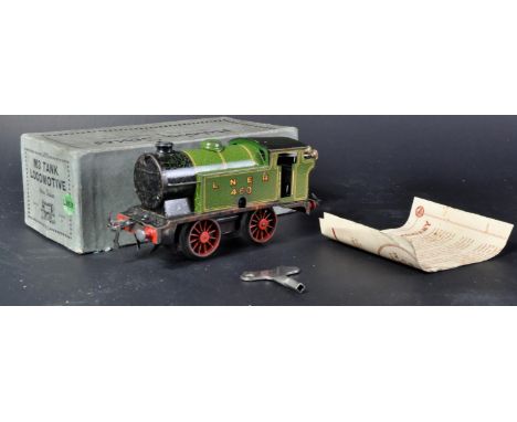 An original vintage Hornby made O gauge tinplate / clockwork model railway trainset locomotive. The LNER M3 tank loco with ke