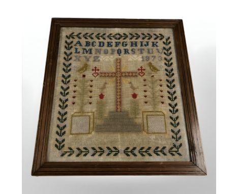 A Victorian alphabet sampler, dated 1873, overall 37 cm x 33 cm.