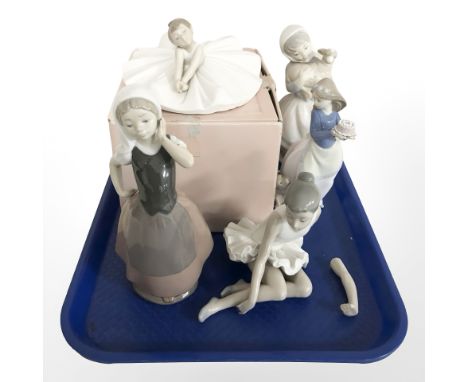 A group of Nao figures including seated ballerina, No. 1283, with box.