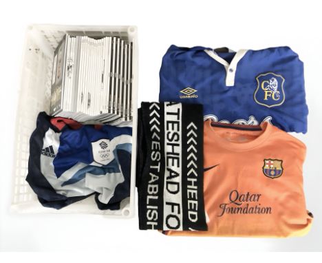 A group of modern Newcastle United match day programmes, scarf, Barcelona and Chelsea football shirts, etc. (1 box)