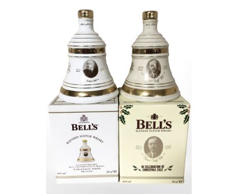 Two Bell's blended scotch whisky decanters, Christmas 2009 and 2012, both sealed with original boxes.