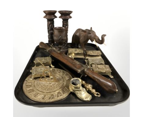 A group of brass trinket boxes, sun dial, Eastern carved candle sticks, carving set in wooden sheath, etc.