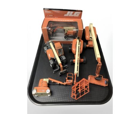 A JLG model 8340AJ articulating boom lift, 1:32 scale, in box, together with four further JLG die cast models. 