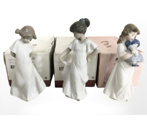 Three boxed Nao figures of girls, No. 1107, 1109 and 1110.