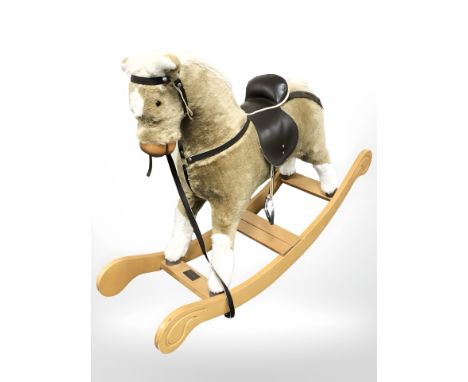 A Mamas & Papas rocking horse.